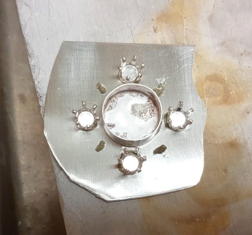 Judy Larson's CZ Explosion Necklace - , Holiday Designs, Cutting, Cutting Tool, Cutters, Filing, Finishing, How To Punch Holes, Hole Punching, Punch A Hole, Tumbling, Tumble, Tumbling Jewelry, Butane Torch, Soldering, Solder, Design, Drilling, Drill, Place dots of medium paste solder 